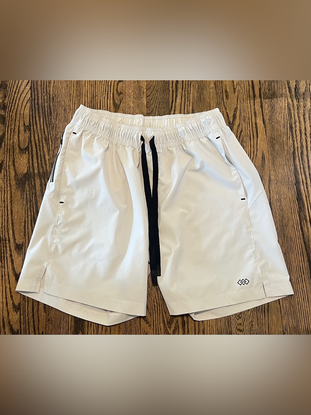 Men's Leg3nd Neutral Athletic Shorts with Black Drawstring and Subtle Logo